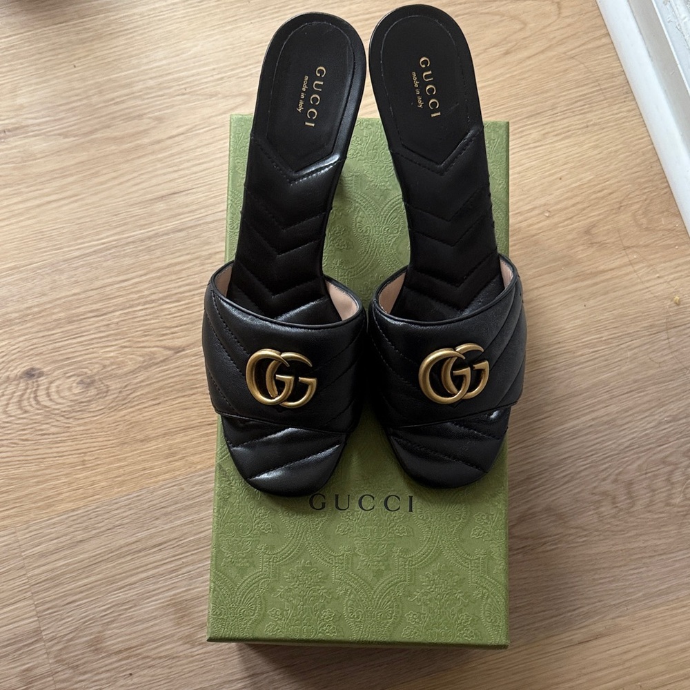 Gucci Black Leather Mules with Gold Logo